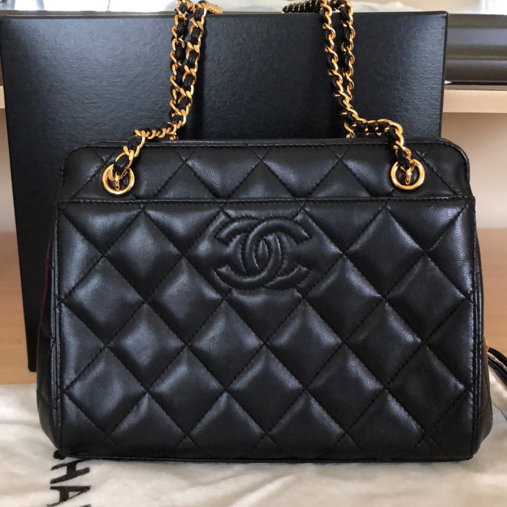 Vintage Chanel mini black lambskin pochette